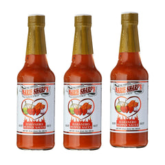 Marie Sharp's botella frontal con etiqueta clara y sabor auténtico