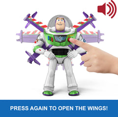 Mattel Buzz pulsando botón rojo, activa sonidos y despliegue de alas