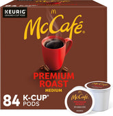 McCafé paquete frontal 84 cápsulas K-Cup mostrando cantidad y marca, conveniencia