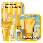 medicube frontal del embalaje del Fresh Glow Body Kit mostrando el set completo y beneficios de viaje