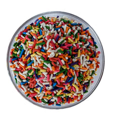 Medley Hills Farm sprinkles aplicadas en cupcake para presentación festiva