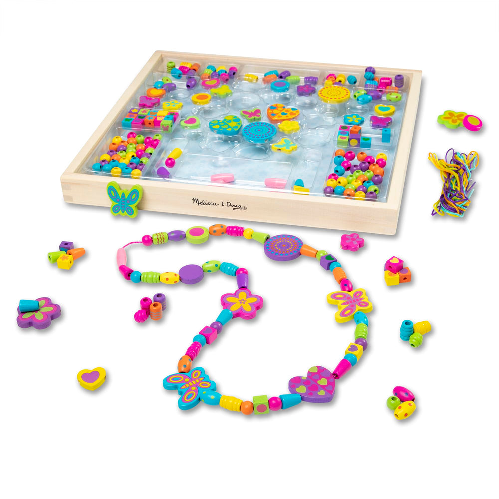 Melissa & Doug bandeja frontal mostrando todas las piezas y fácil almacenamiento