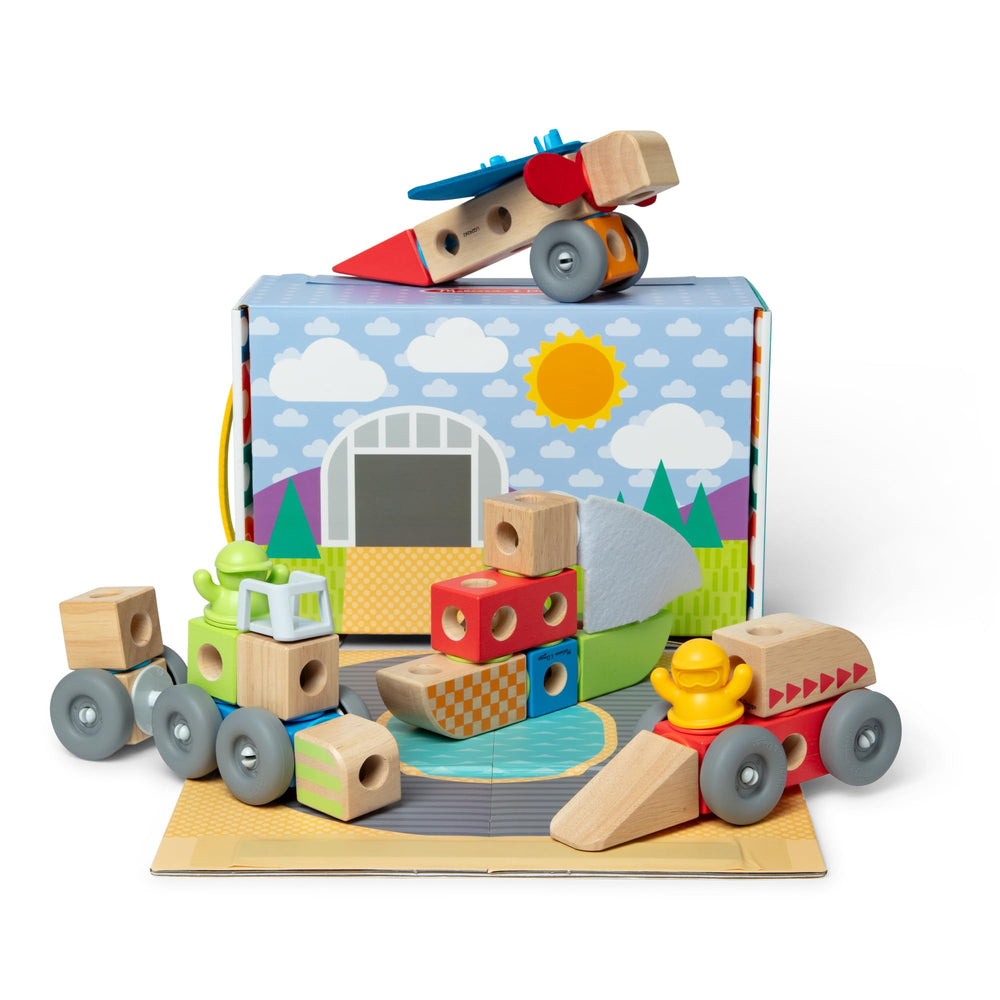 Melissa & Doug vista frontal del set Vehicles mostrando piezas coloridas y caja
