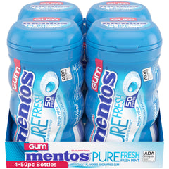 Mentos piezas dispersas sobre mesa mostrando cantidad y color Fresh Mint