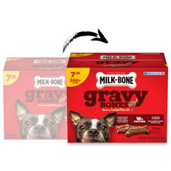 Milk-Bone galletas en mano demostrando tamaño pequeño y conveniencia