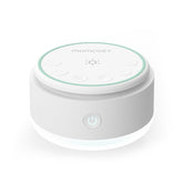 Momcozy vista frontal del dispositivo mostrando controles y diseño portátil para dormir