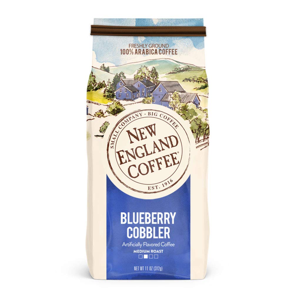 New England Coffee front packaging showing blueberry cobbler flavor and benefits