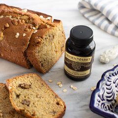 Nielsen-Massey aplicado en glaseado de tarta, mejora sabor y apariencia