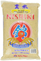 Nishiki bolsa frontal 15 lb mostrando etiqueta y grado premium, conveniencia para familias