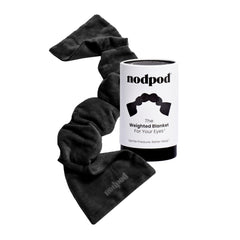 nodpod vista frontal del empaquetado mostrando la máscara y su diseño relajante