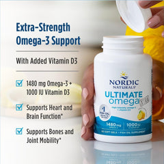Nordic Naturals cápsula en mano para comparar tamaño y dosificación