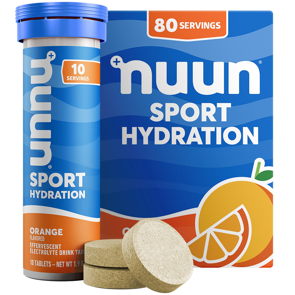 Nuun frente del tubo naranja mostrando el envase portable y sus beneficios