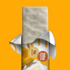 ONE barra Lemon Cake abierta mostrando interior rico en proteína y sabor