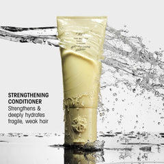 Etiqueta trasera Oribe Hair Alchemy mostrando ingredientes y beneficios claros