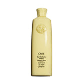 Oribe frasco frontal mostrando diseño elegante y beneficio fortificante