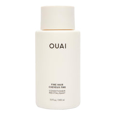 OUAI frasco frontal mostrando diseño y volumen del acondicionador