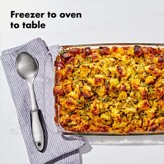 OXO side profile of 9x13 dish with slosh-proof lid for spill prevention