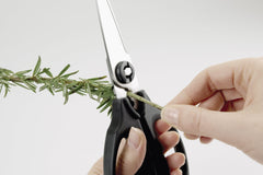 OXO Good Grips close-up of micro-serrated stainless blade edge for secure, precise cuts