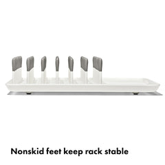 OXO Tot drying rack loaded with bottles demonstrating upright airflow benefit