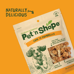 Pet 'n Shape mano sosteniendo golosina para comparar tamaño y porción segura