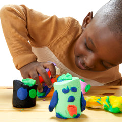 Play‑Doh confetti cans top view showing flecked texture for playful crafts
