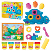 Play-Doh frente del set Dino mostrando figura y accesorios para juego organizado