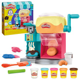 Play‑Doh vista frontal del Donut Drop Shop con accesorios incluidos, fomenta creatividad
