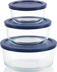 Pyrex vista frontal del set con tapas azules útil para almacenar