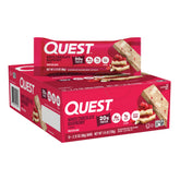 Quest empaque frontal de la barra frambuesa chocolate blanco mostrando 12 unidades