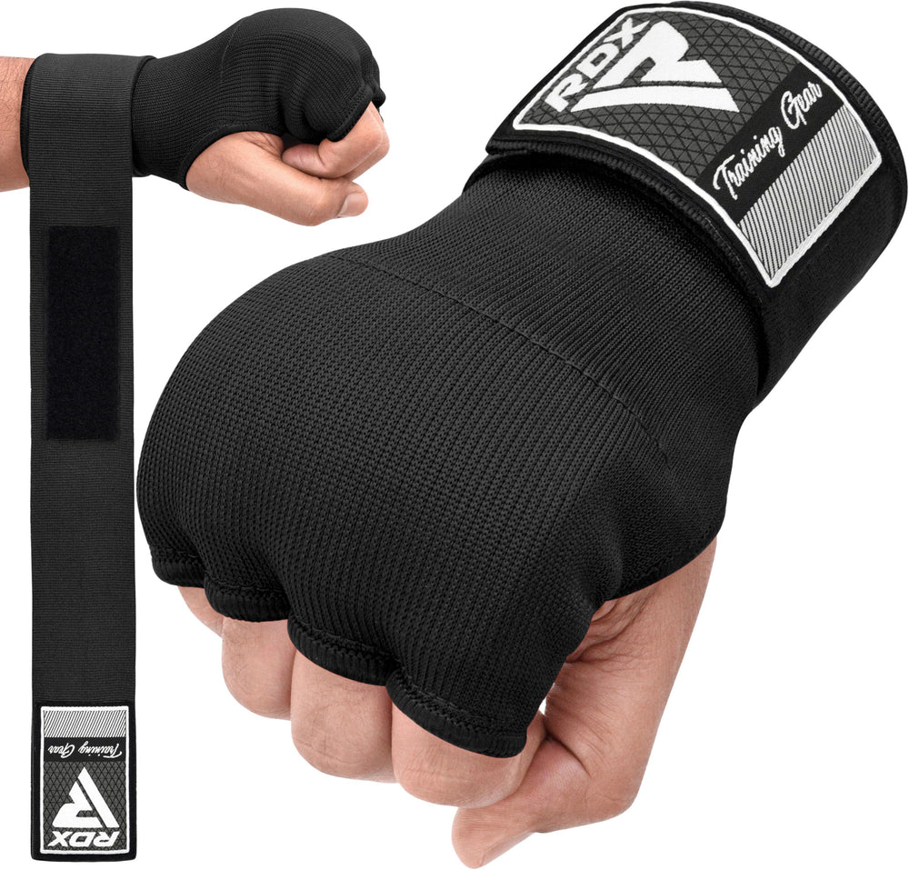 RDX guantes internos frente mostrando ajuste y protección