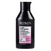 Redken envase frontal del acondicionador, presentación profesional y brillo
