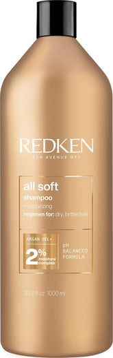 Redken botella frontal mostrando diseño profesional y beneficio hidratante