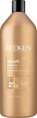 Redken botella frontal mostrando diseño profesional y beneficio hidratante