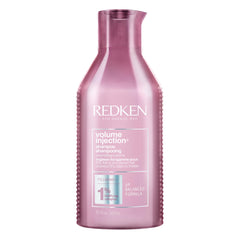 Redken champú frente del envase mostrando diseño profesional y volumen