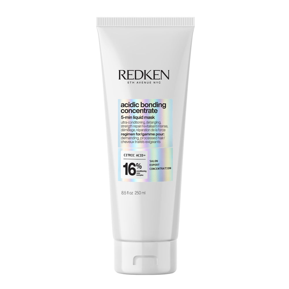 Redken mascarilla frontal mostrando envase y beneficios de reparación