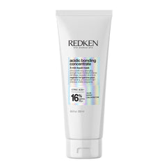 Redken mascarilla frontal mostrando envase y beneficios de reparación
