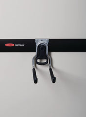 Rubbermaid gancho brazo plegable que ahorra espacio y evita tropiezos
