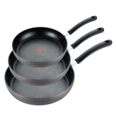 T-Fal vista frontal del juego de tres sartenes mostrando tamaño y acabado, fácil identificación