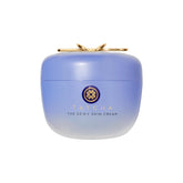 TATCHA frasco frontal de The Dewy Skin Cream mostrando diseño y tamaño sostenido