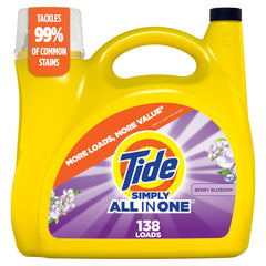 Tide botella frontal Berry Blossom mostrando el envase y beneficio de limpieza