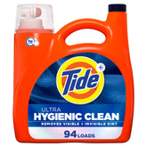 Tide botella frontal mostrando etiqueta y aroma Original, limpieza confiable
