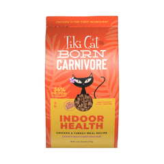 TIKI PETS bolsa frontal del alimento seco con pollo y pavo, muestra ingredientes reales