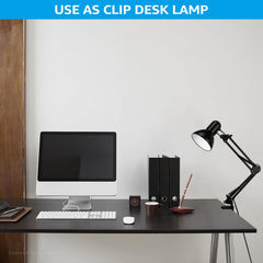 TORCHSTAR lamp clamped to a desk with C-clamp showing secure mounting on work surfaces