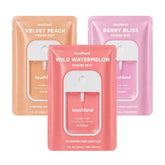 Touchland Juicy Trio frontal con los tres sprays, práctico y compacto