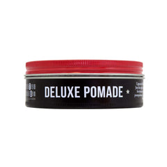 UPPERCUT DELUXE being warmed on hands for smooth application benefit