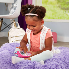 VTech teléfono Gabby's Dollhouse vista lateral junto a una regla para comparar tamaño práctico