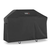 Weber funda frontal sobre Genesis 300 Series protegiendo de lluvia