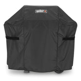 Weber funda frontal negra mostrando ajuste y protección contra lluvia