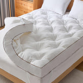 WhatsBedding vista frontal del topper empaquetado y listo para instalar, mejora el confort