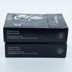 xuan chi cigarrillo herbal en mano en ambiente social mostrando sustituto sin nicotina